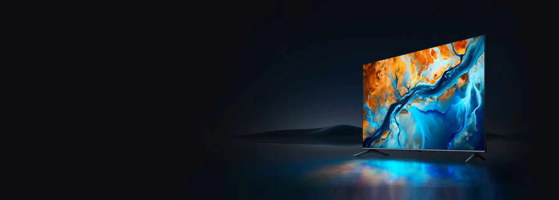 A Xiaomi television lit against a dark backdrop